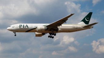 LONDON / UNITED KINGDOM - JULY 14, 2018: PIA Pakistan International Airlines Boeing 777-200 AP-BGL passenger plane landing at London Heathrow Airport