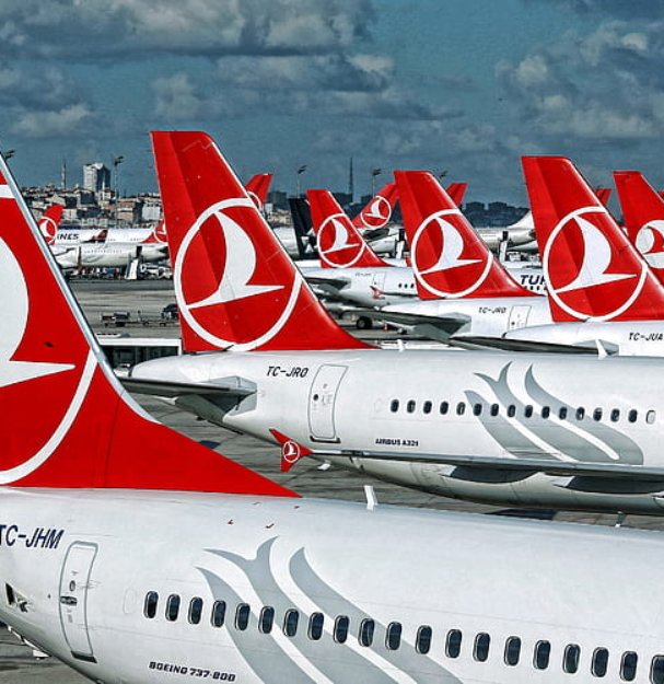 HD-wallpaper-turkish-airlines-boeing-737-airbus-a321-turkish-airlines-logo-on-empennage-passenger-airplanes-red-tails-with-logo-airport-turkey-turkish-airlines-logo